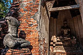 Ayutthaya, Thailand. Wat Chaiwatthanaram, the remains of Buddha statues inside the corner chedi of the gallery. 